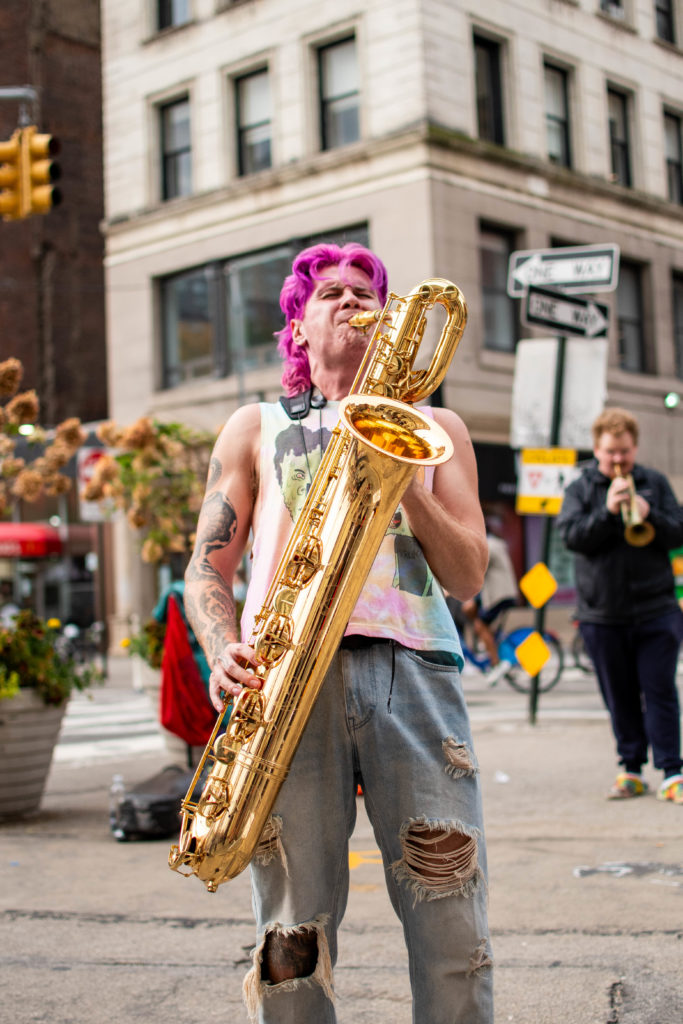 Too Many Zooz Baritone Saxophone Player Leo Pellegrino performing in Union Square New York City