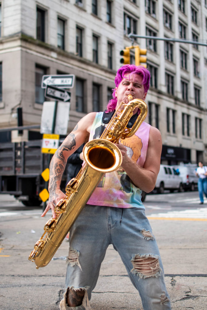 Too Many Zooz Baritone Saxophone Player Leo Pellegrino performing in Union Square New York City