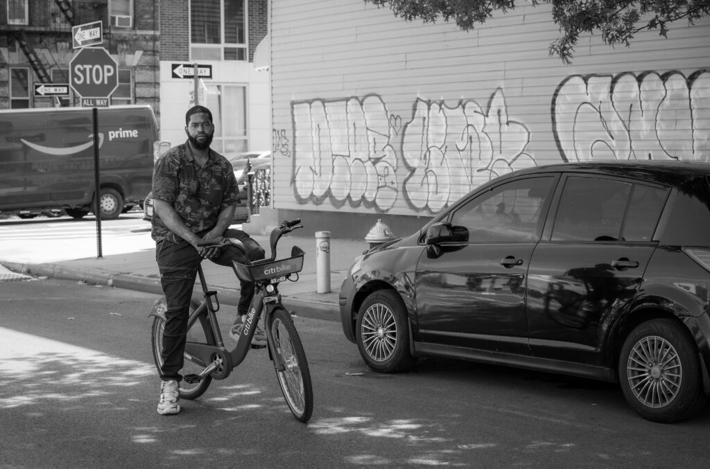 Man on a Citi Bike in Brooklyn, New York